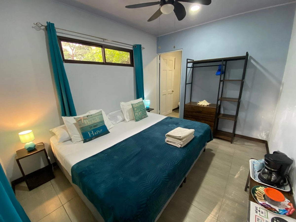 Economy room bedroom at Hotel Tabasco