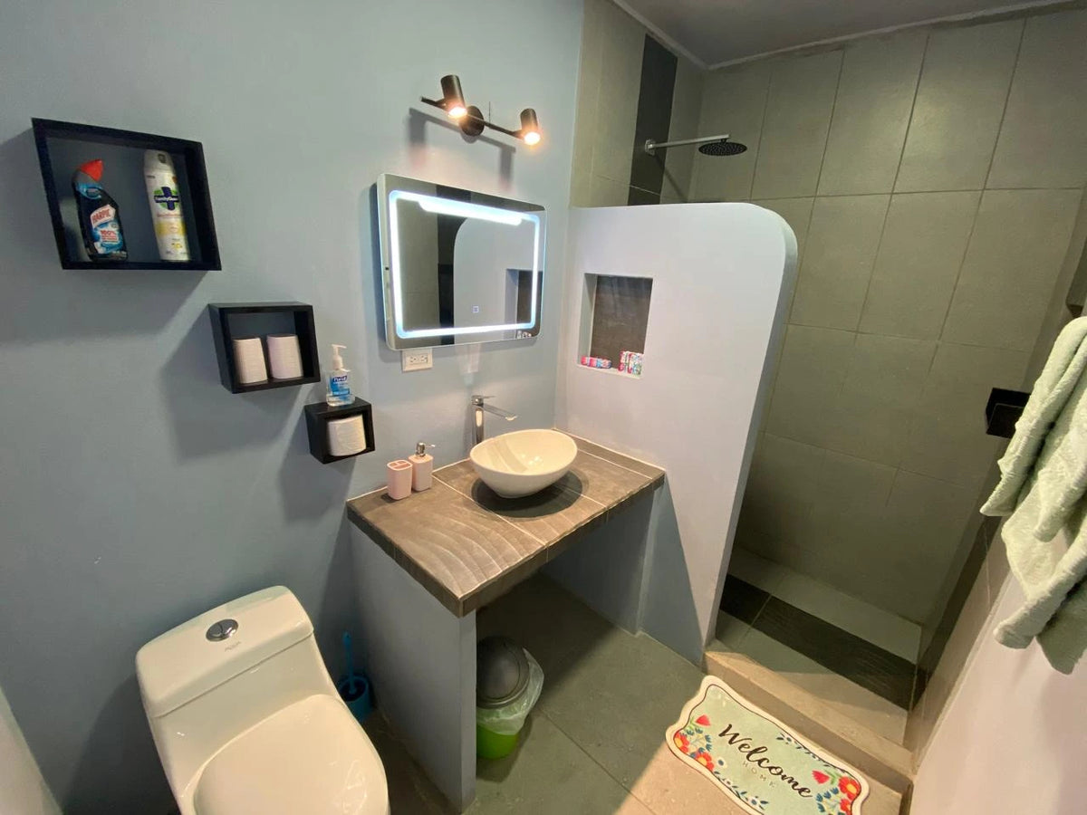 Economy room bathroom at Hotel Tabasco